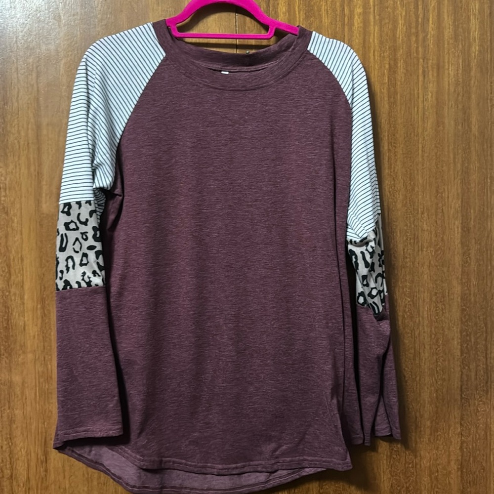 Long sleeved mixed print top